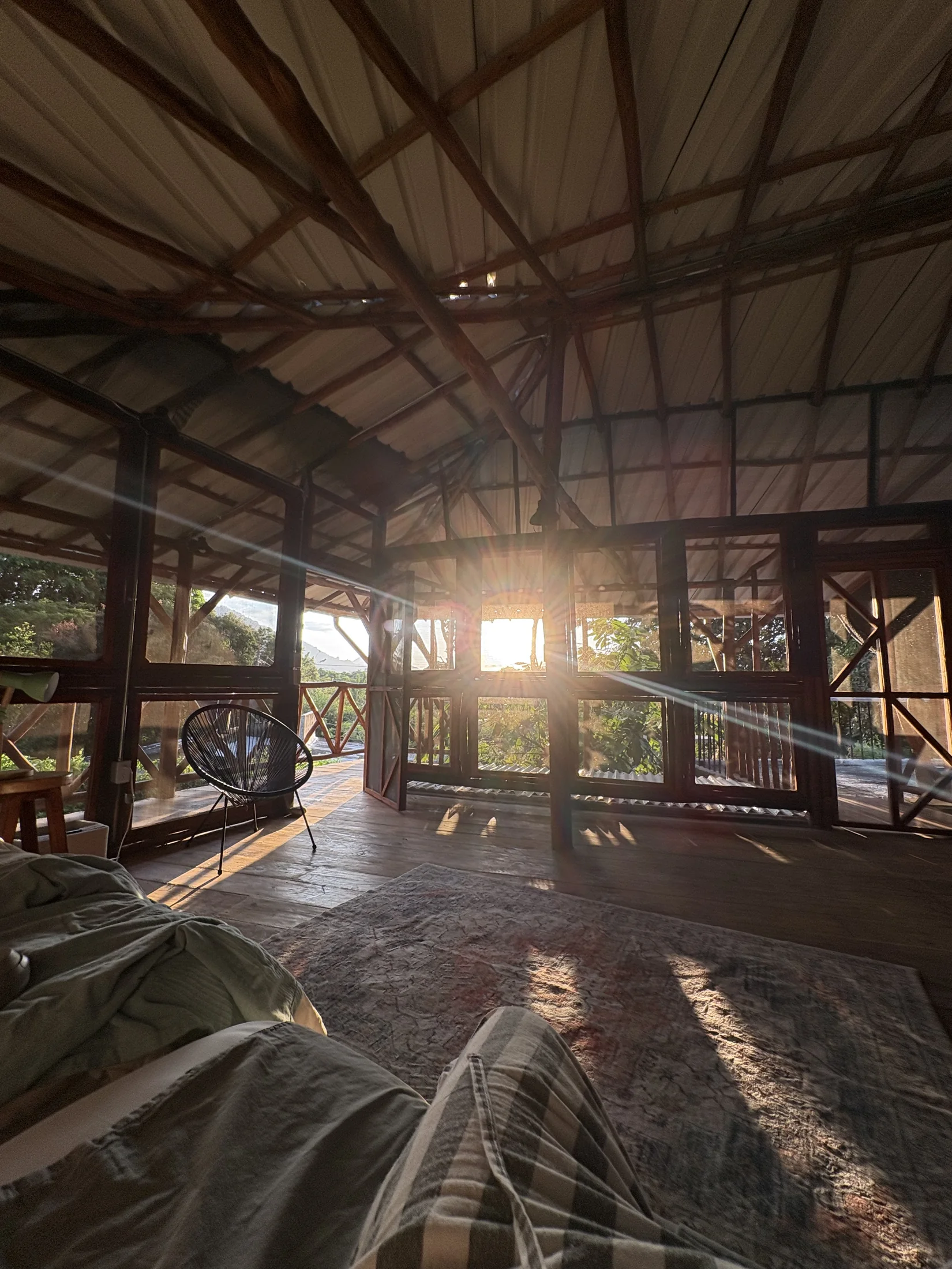 Open-air room and terrace surrounded by greenery at Casa Canela in Minca